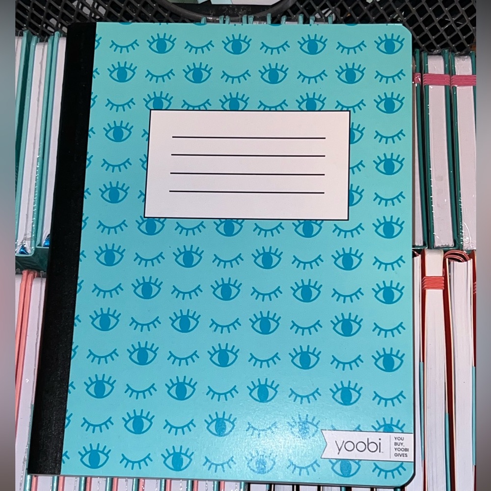 Green seeing eye graphic print composition notebook college ruled